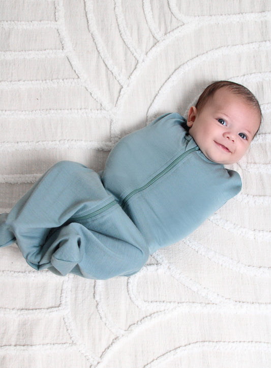 When to stop swaddling and how to transition baby to arms-out sleeping