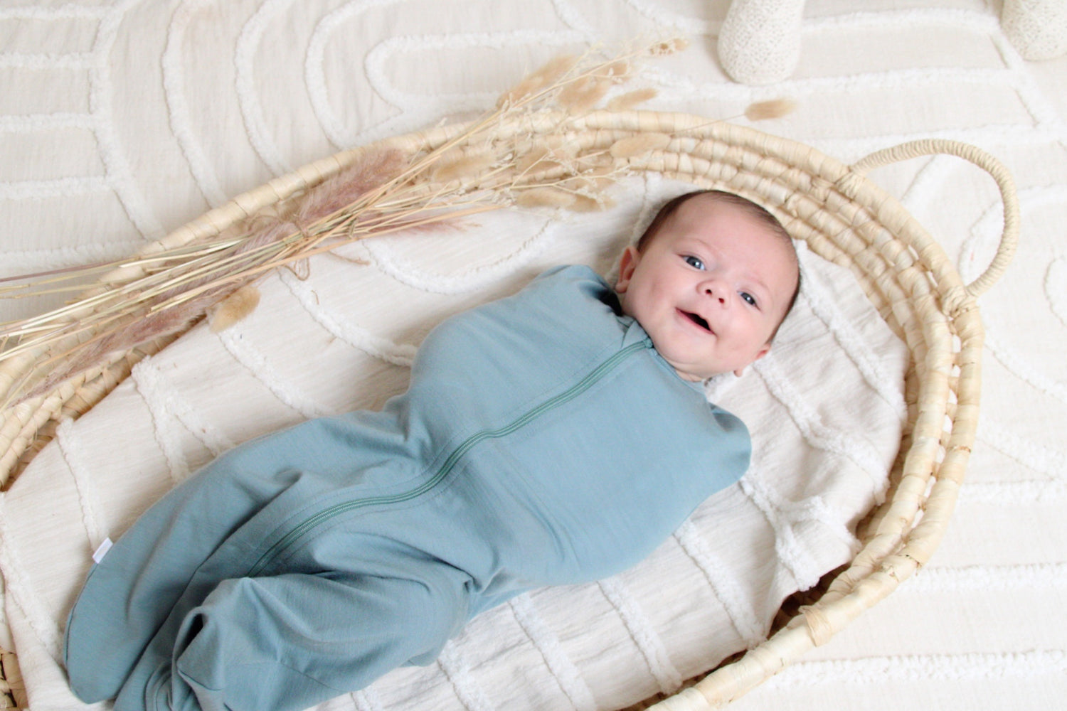 merino swaddle on baby