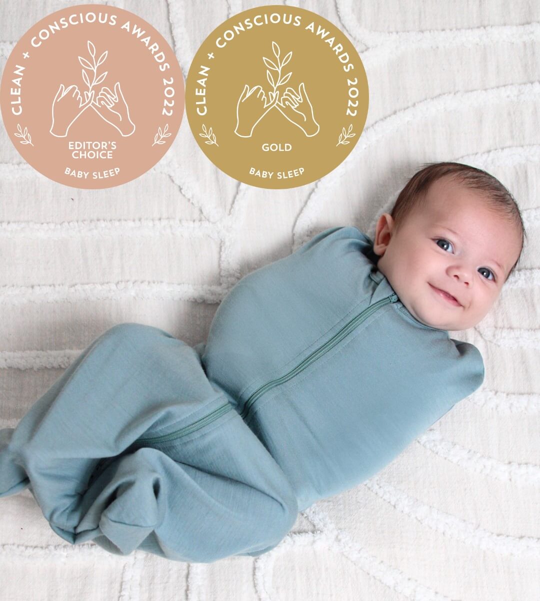 baby boy wearing newborn swaddle sack